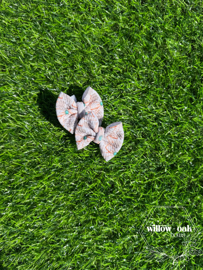 cow print bow w turquoise