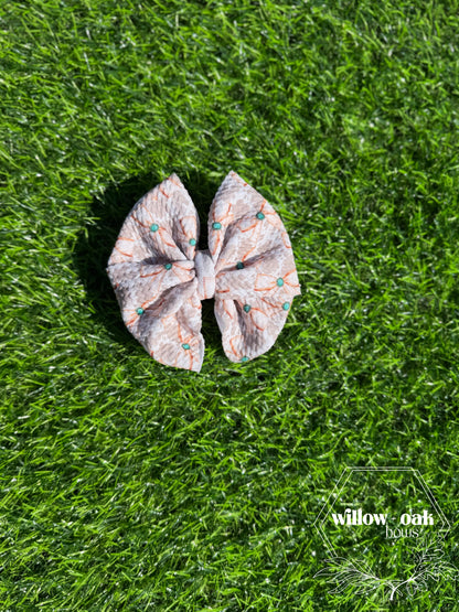 cow print bow w turquoise