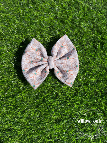 cow print bow w turquoise